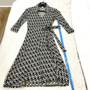 Three-quarter sleeve length wrap dress